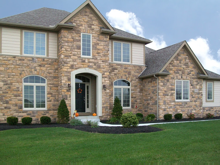 Stone veneer siding on a house.